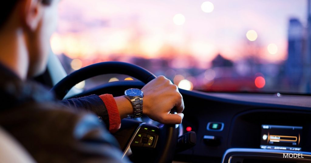 Man driving a car