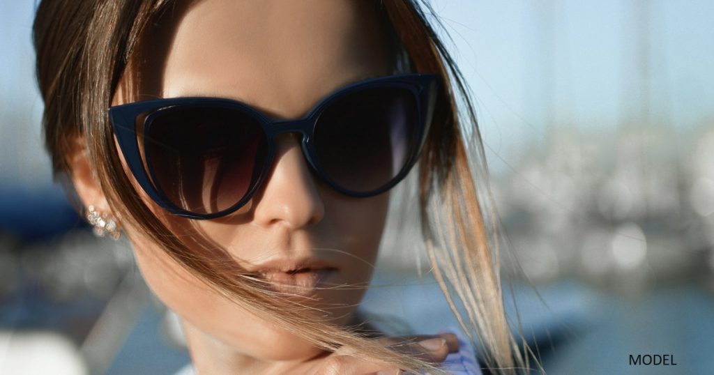 Young woman in sunglasses