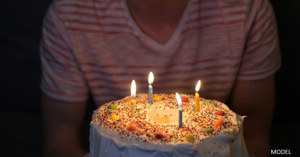 Person with birthday cake